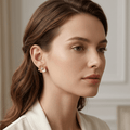 Golden Bloom Textured Floral Stud Earrings - Orlumea
